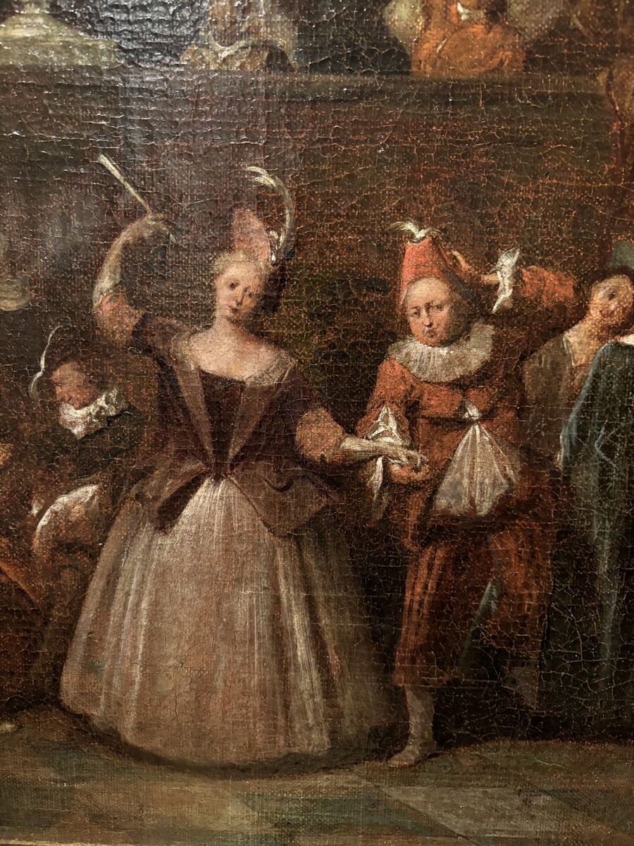 18th century painting ‘Dance scene with Harlequin’ oil on canvas. Decorative painting depicting a dance scene of nobles with a harlequin in a city garden.