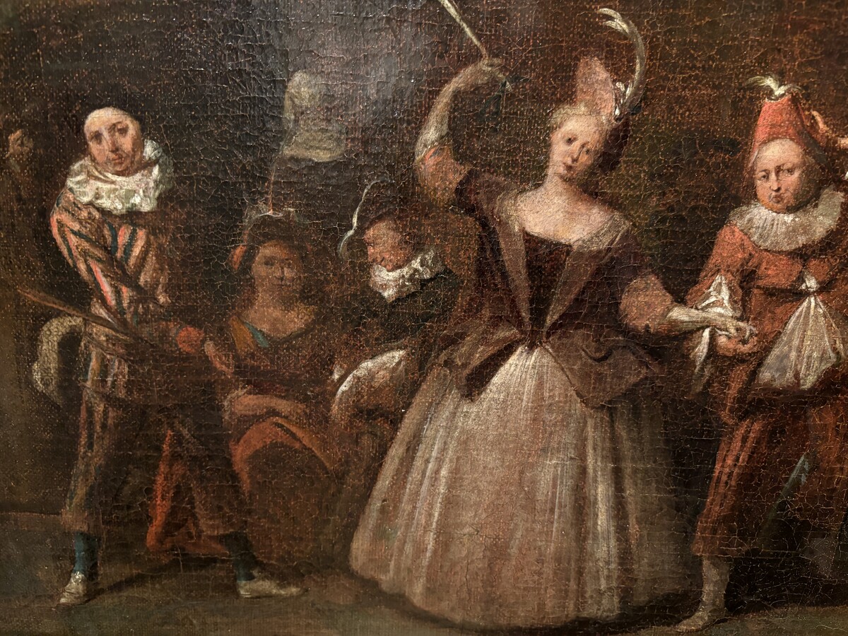 18th century painting ‘Dance scene with Harlequin’ oil on canvas. Decorative painting depicting a dance scene of nobles with a harlequin in a city garden.