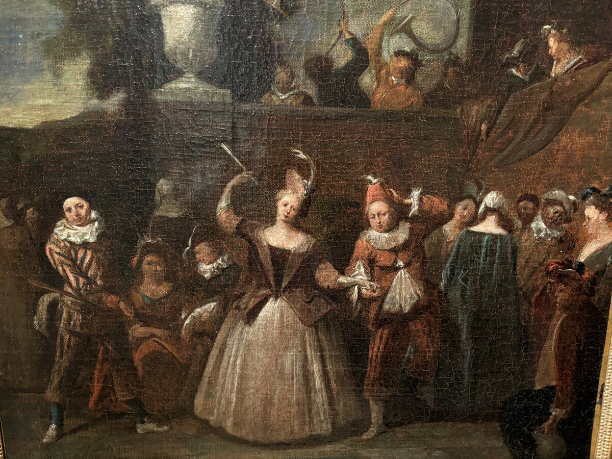 18th century painting ‘Dance scene with Harlequin’ oil on canvas. Decorative painting depicting a dance scene of nobles with a harlequin in a city garden.