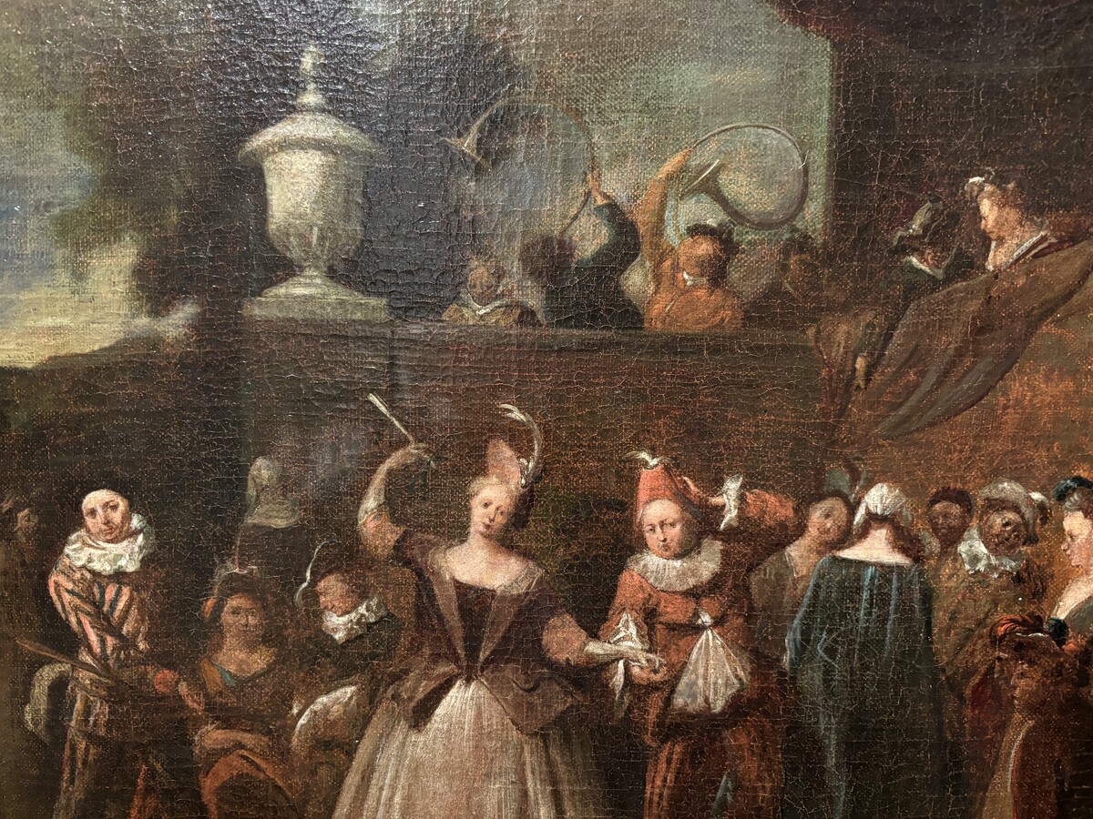 18th century painting ‘Dance scene with Harlequin’ oil on canvas. Decorative painting depicting a dance scene of nobles with a harlequin in a city garden.