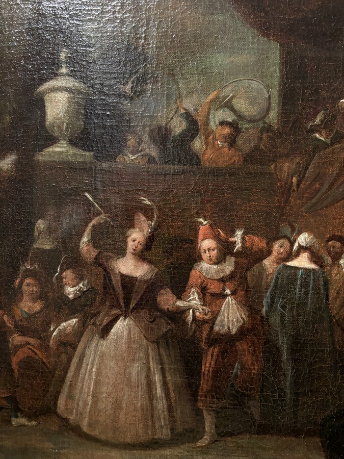 18th century painting ‘Dance scene with Harlequin’ oil on canvas. Decorative painting depicting a dance scene of nobles with a harlequin in a city garden.