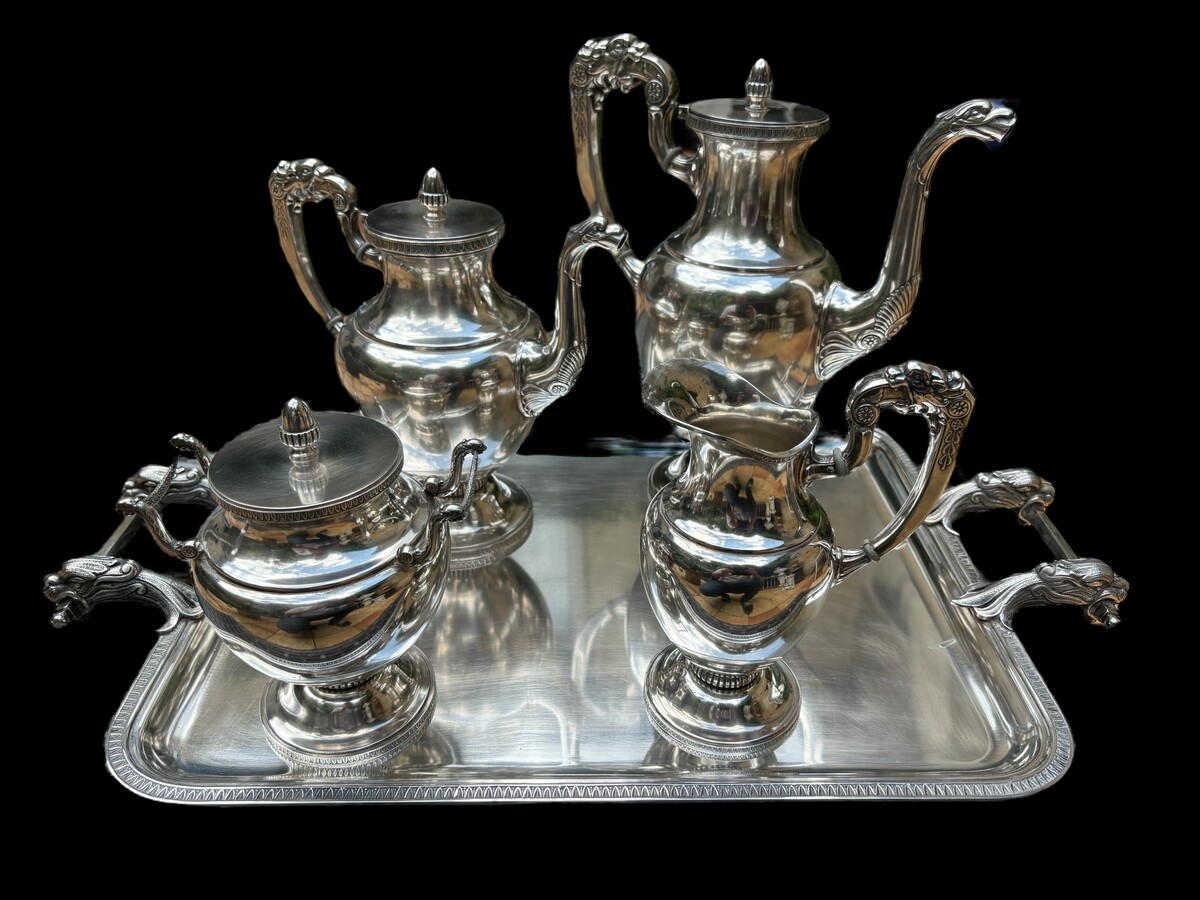 5-piece coffee service in silver-plated metal Wiskemann 19th century. Lovely Empire-style service comprising coffee, tea, milk jug and sugar bowl standing on silver-plated saucer set with griffins. In very good condition ( just see pict.14 )