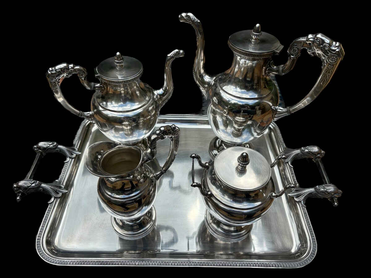 5-piece coffee service in silver-plated metal Wiskemann 19th century. Lovely Empire-style service comprising coffee, tea, milk jug and sugar bowl standing on silver-plated saucer set with griffins. In very good condition ( just see pict.14 )