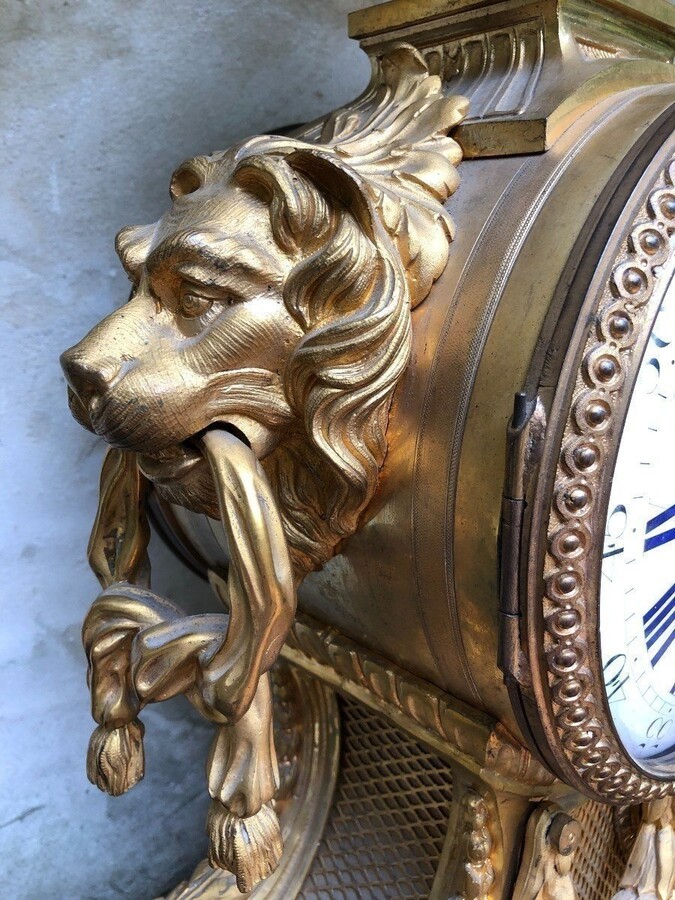 A Large Gilt Bronze LXVI Style Mantelpiece Paris, 19th Century. The Clock And The Candelabras Are Gilded With Matt And Bright Gold. Clock Signed By G.Philippe, Palais Royal 66 & 67 In Paris. Dimensions Clock: 68 Cm High, 42 Cm Wide And 24 Cm Deep.