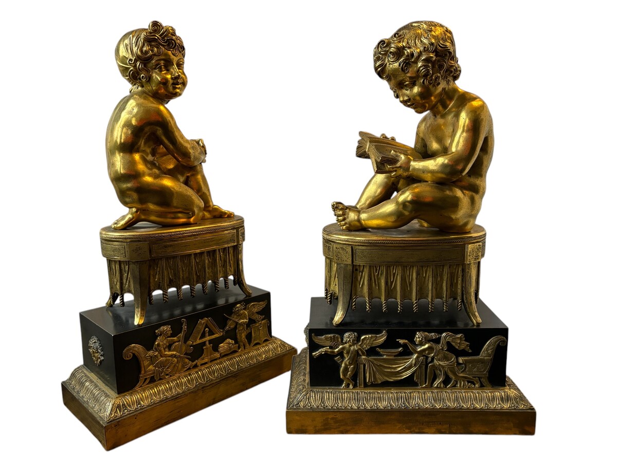 A pair of early 19th century gilt and patinated bronze sculptures. Quality bronzes with very fine details. Both sculptures are in very good condition with signs of use to the gilding