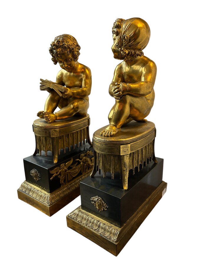 A pair of early 19th century gilt and patinated bronze sculptures. Quality bronzes with very fine details. Both sculptures are in very good condition with signs of use to the gilding