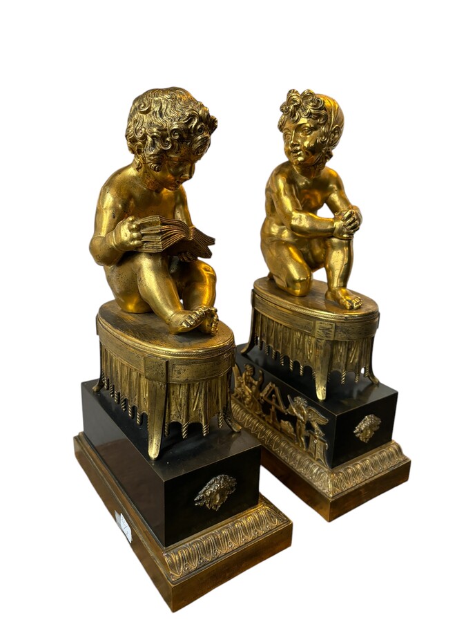 A pair of early 19th century gilt and patinated bronze sculptures. Quality bronzes with very fine details. Both sculptures are in very good condition with signs of use to the gilding