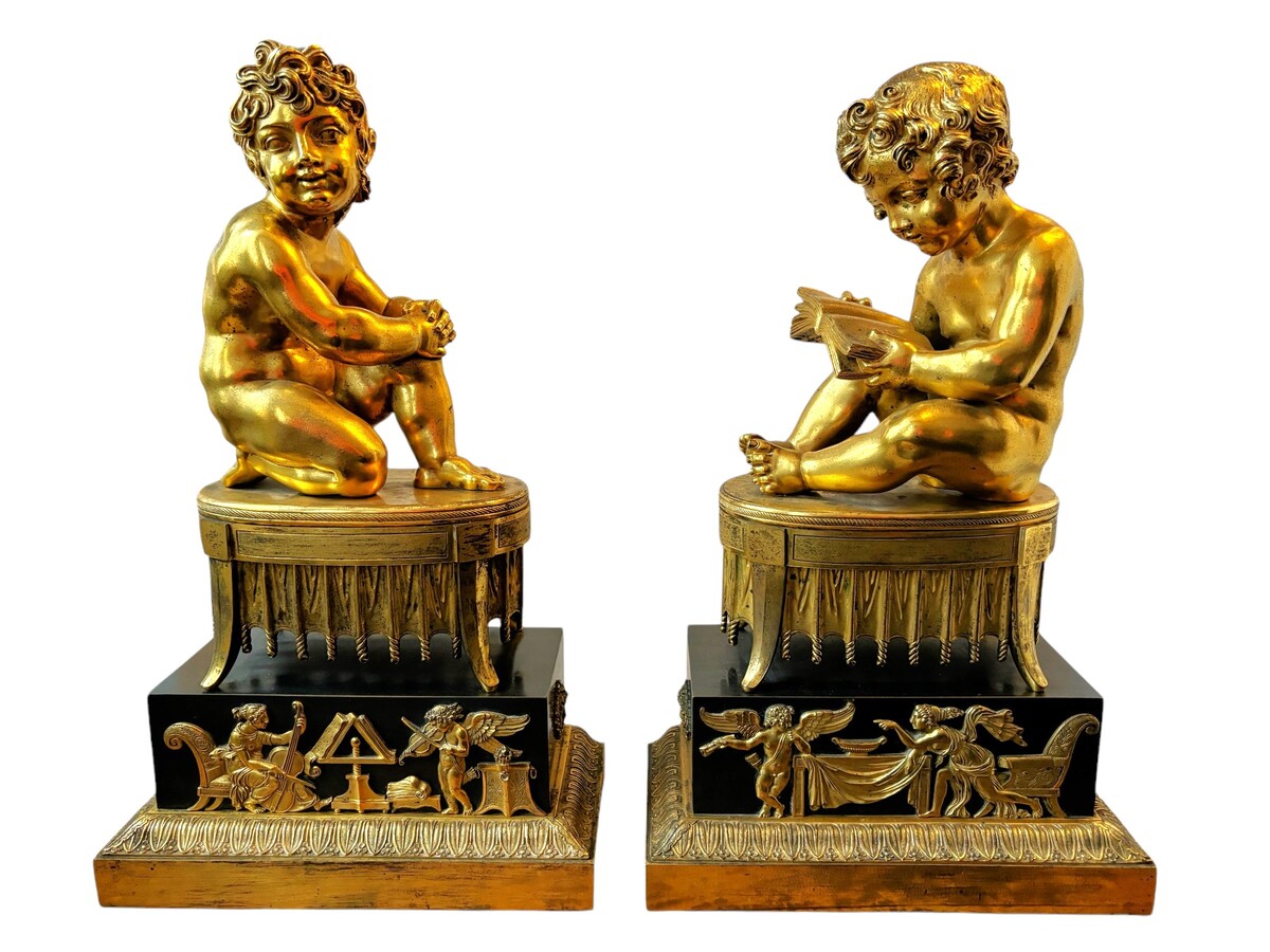 A pair of early 19th century gilt and patinated bronze sculptures. Quality bronzes with very fine details. Both sculptures are in very good condition with signs of use to the gilding