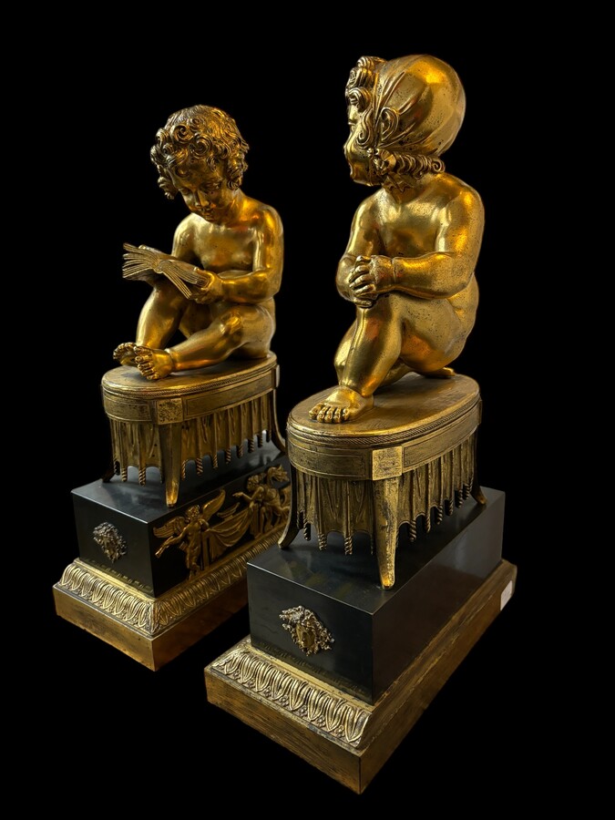 A pair of early 19th century gilt and patinated bronze sculptures. Quality bronzes with very fine details. Both sculptures are in very good condition with signs of use to the gilding