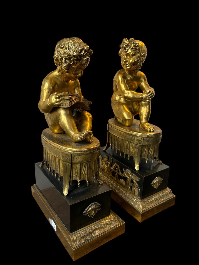 A pair of early 19th century gilt and patinated bronze sculptures. Quality bronzes with very fine details. Both sculptures are in very good condition with signs of use to the gilding