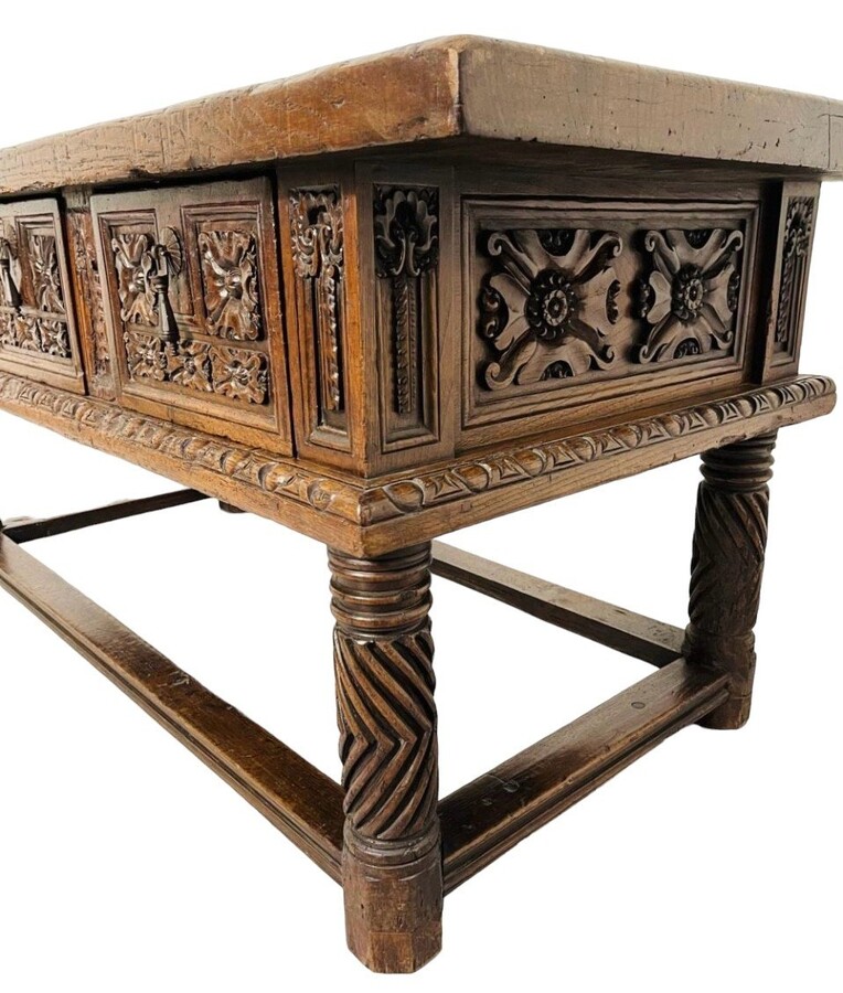 Beautiful Spanish table in Chestnut wood 17th century. Large sturdy table finished on 4 sides with beautiful wood carved decorations and fitted with 3 large drawers at the front. Beautiful thick top of 5 cm. Table in good condition