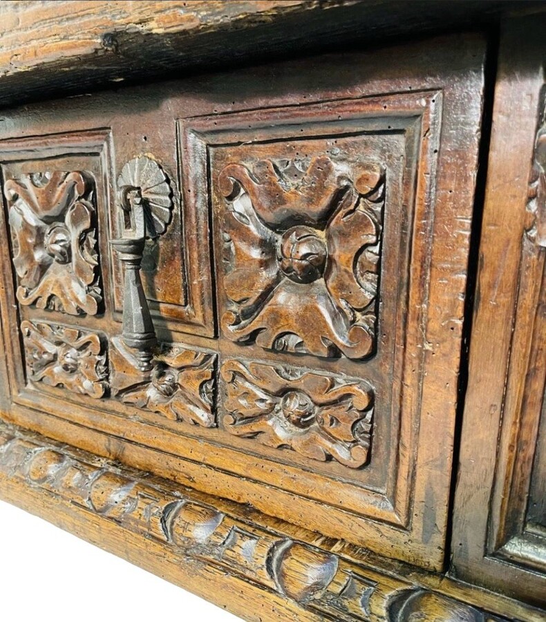 Beautiful Spanish table in Chestnut wood 17th century. Large sturdy table finished on 4 sides with beautiful wood carved decorations and fitted with 3 large drawers at the front. Beautiful thick top of 5 cm. Table in good condition