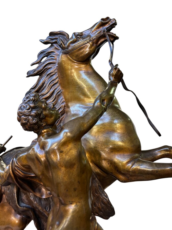 Bronze sculpture by Guillaume Coustou ‘Le cheval de Marly’ (1677 - 1746) Decorative sculpture from the 19th century Dimensions : Height : 58 cm Width : 49 cm Depth : 24 cm In good condition