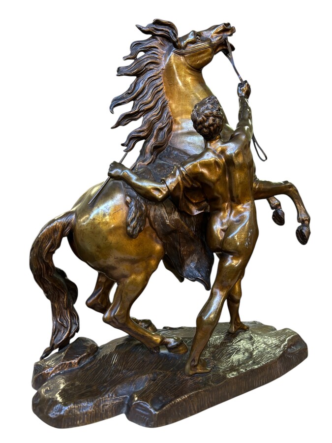 Bronze sculpture by Guillaume Coustou ‘Le cheval de Marly’ (1677 - 1746) Decorative sculpture from the 19th century Dimensions : Height : 58 cm Width : 49 cm Depth : 24 cm In good condition