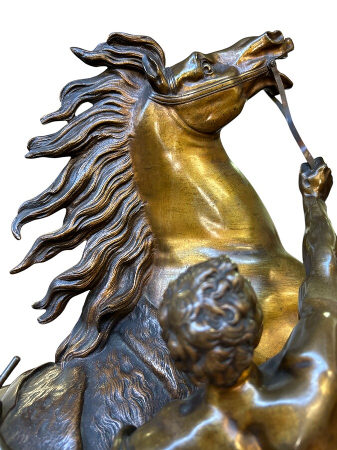 Bronze sculpture by Guillaume Coustou ‘Le cheval de Marly’ (1677 - 1746) Decorative sculpture from the 19th century Dimensions : Height : 58 cm Width : 49 cm Depth : 24 cm In good condition