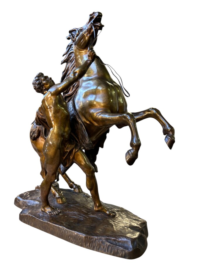 Bronze sculpture by Guillaume Coustou ‘Le cheval de Marly’ (1677 - 1746) Decorative sculpture from the 19th century Dimensions : Height : 58 cm Width : 49 cm Depth : 24 cm In good condition