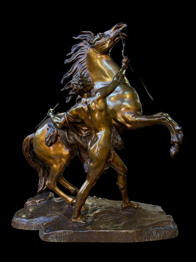 Bronze sculpture by Guillaume Coustou ‘Le cheval de Marly’ (1677 - 1746) Decorative sculpture from the 19th century Dimensions : Height : 58 cm Width : 49 cm Depth : 24 cm In good condition