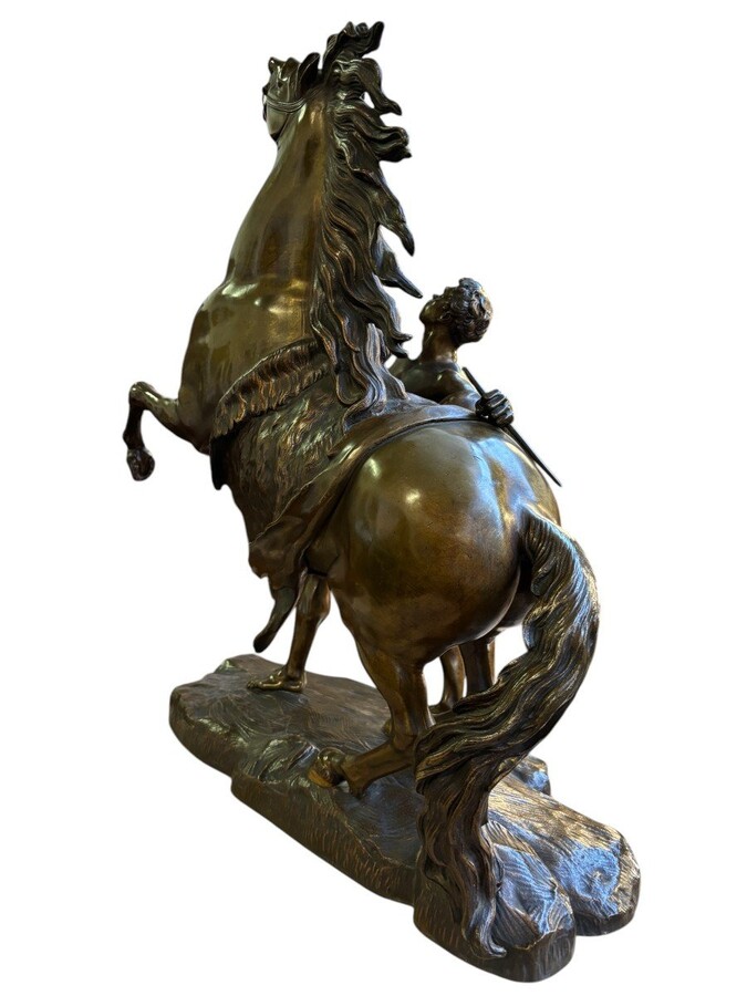 Bronze sculpture by Guillaume Coustou ‘Le cheval de Marly’ (1677 - 1746) Decorative sculpture from the 19th century Dimensions : Height : 58 cm Width : 49 cm Depth : 24 cm In good condition