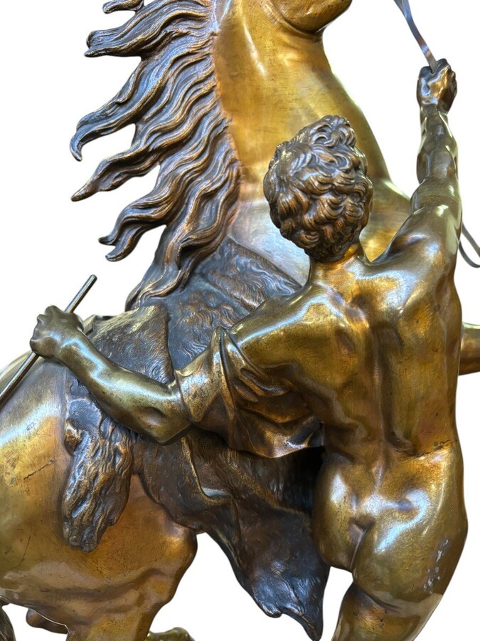 Bronze sculpture by Guillaume Coustou ‘Le cheval de Marly’ (1677 - 1746) Decorative sculpture from the 19th century Dimensions : Height : 58 cm Width : 49 cm Depth : 24 cm In good condition