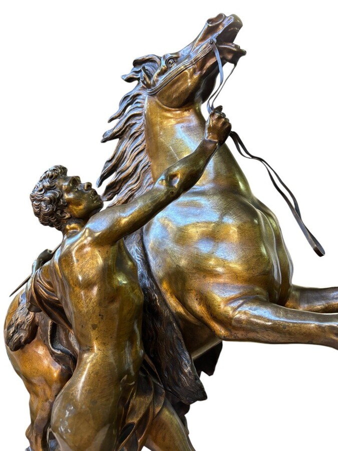 Bronze sculpture by Guillaume Coustou ‘Le cheval de Marly’ (1677 - 1746) Decorative sculpture from the 19th century Dimensions : Height : 58 cm Width : 49 cm Depth : 24 cm In good condition