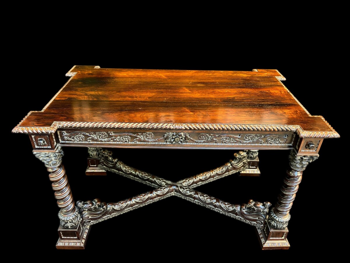 Center table / desk in rosewood 19thC. Very good quality and finely carved table, with 4 twisted columns with Corinthian capitals, figures, carvings and decorations all around. The desk has a large drawer and the interior is in solid lemon wood. 