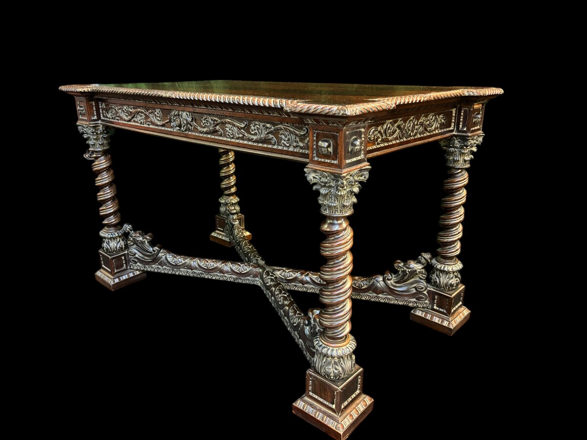 Center table / desk in rosewood 19thC. Very good quality and finely carved table, with 4 twisted columns with Corinthian capitals, figures, carvings and decorations all around. The desk has a large drawer and the interior is in solid lemon wood. 