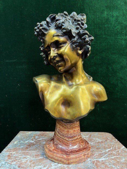 Charming bust ‘ Bacchus ’ in bronze signed by Nelson 19thC. Decorative bronze sculpture standing on a coloured marble base and signed at the back by Anton Nelson ( 1849-1910 ) Dimensions : Height : 53 cm