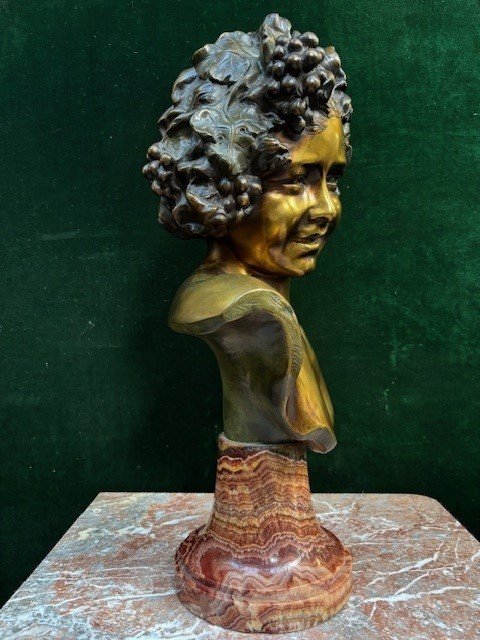 Charming bust ‘ Bacchus ’ in bronze signed by Nelson 19thC. Decorative bronze sculpture standing on a coloured marble base and signed at the back by Anton Nelson ( 1849-1910 ) Dimensions : Height : 53 cm