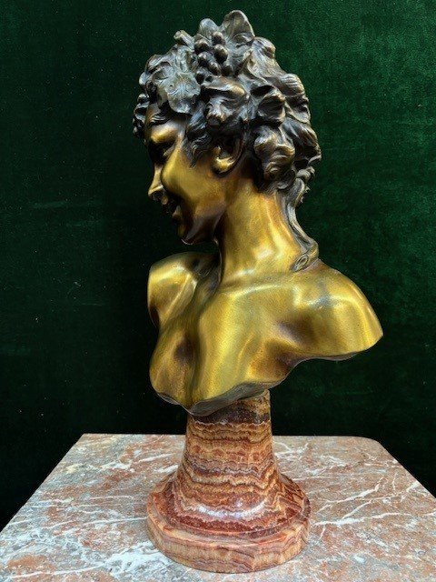 Charming bust ‘ Bacchus ’ in bronze signed by Nelson 19thC. Decorative bronze sculpture standing on a coloured marble base and signed at the back by Anton Nelson ( 1849-1910 ) Dimensions : Height : 53 cm