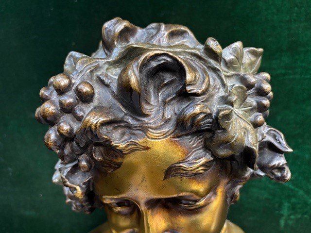 Charming bust ‘ Bacchus ’ in bronze signed by Nelson 19thC. Decorative bronze sculpture standing on a coloured marble base and signed at the back by Anton Nelson ( 1849-1910 ) Dimensions : Height : 53 cm