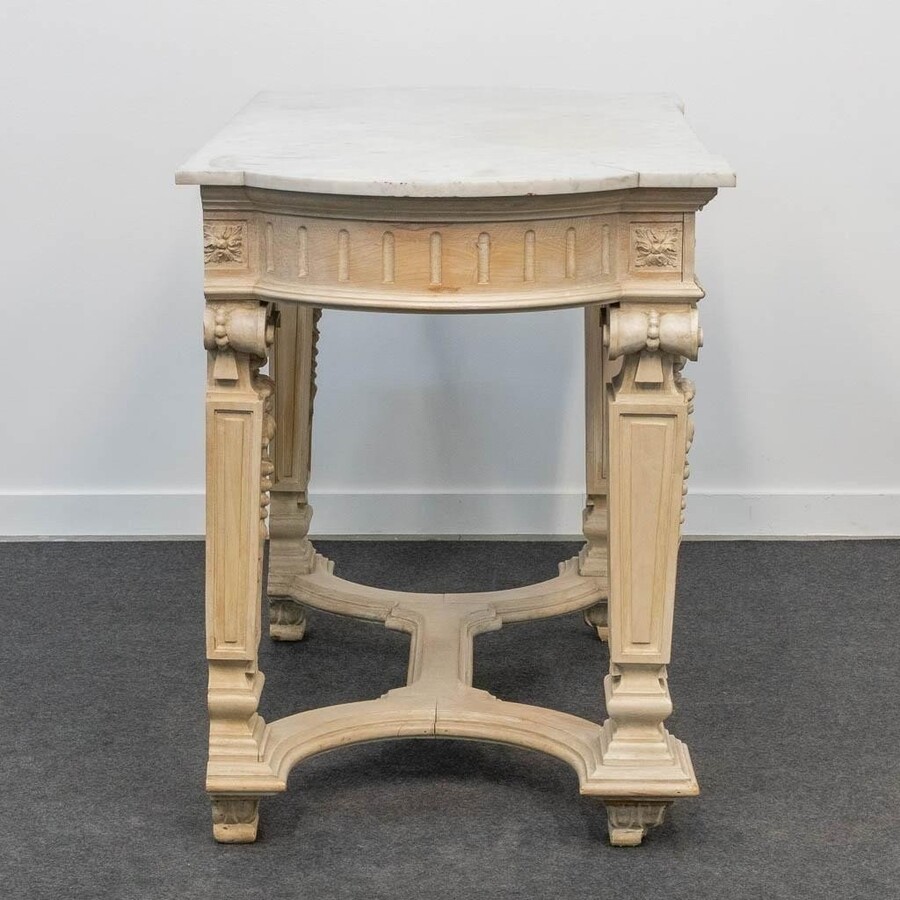 Decorative console of sculpted wood Louis XVI style late 19th century. Model with iconic columns minor damages and crack in marble top. Dimensions : Width: 125 cm Height: 87 cm Depth: 65,5 cm