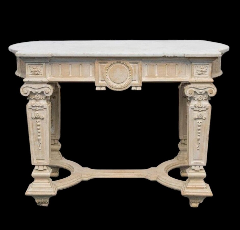 Decorative console of sculpted wood Louis XVI style late 19th century. Model with iconic columns minor damages and crack in marble top. Dimensions : Width: 125 cm Height: 87 cm Depth: 65,5 cm