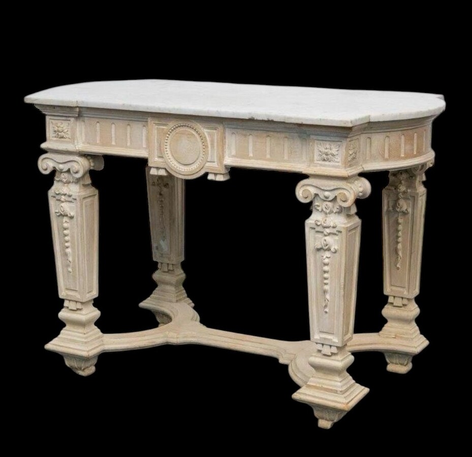 Decorative console of sculpted wood Louis XVI style late 19th century. Model with iconic columns minor damages and crack in marble top. Dimensions : Width: 125 cm Height: 87 cm Depth: 65,5 cm