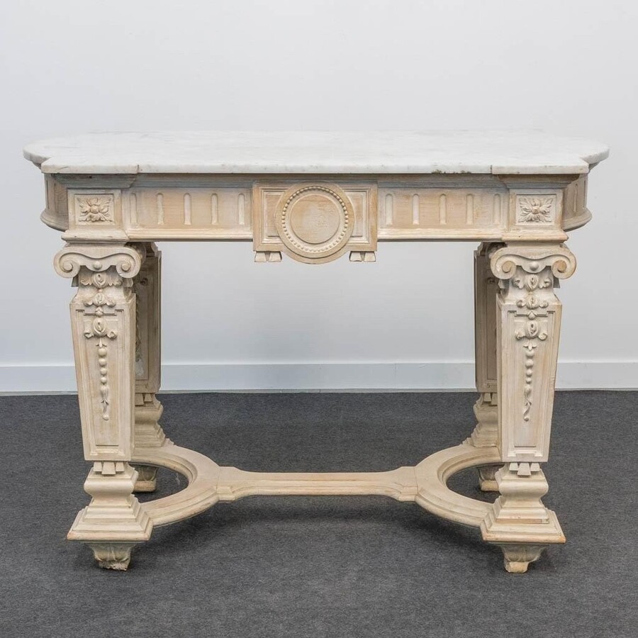 Decorative console of sculpted wood Louis XVI style late 19th century. Model with iconic columns minor damages and crack in marble top. Dimensions : Width: 125 cm Height: 87 cm Depth: 65,5 cm