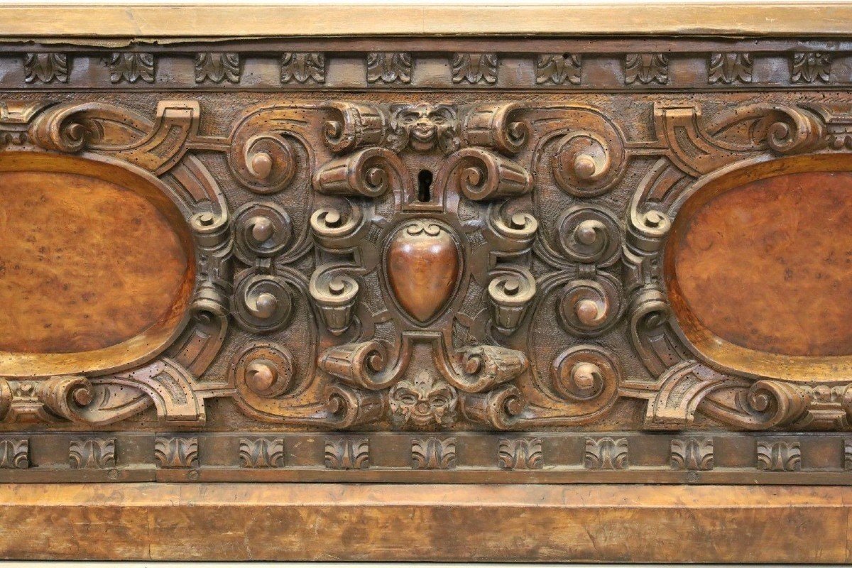 Italian Renaissance Walnut Chest From The 17th Century. Decorative Chest With Beautiful Decorations Dating From Around 1700. The Chest Is In Good Condition, Used. The Bronze Handles On The Sides Are Missing. Dimensions: Length: 168 Cm Height : 48 Cm