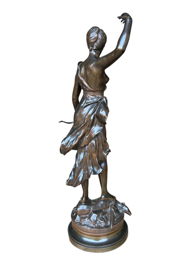 Large 19th century bronze sculpture of Diana the Huntress ( 73 cm ) Beautiful sculpture representing Diana standing over her prey shot with a bow and arrows. Signed by A.Levasseur ( Henri Louis Levasseur , Paris 1853-1934) Dimensions :