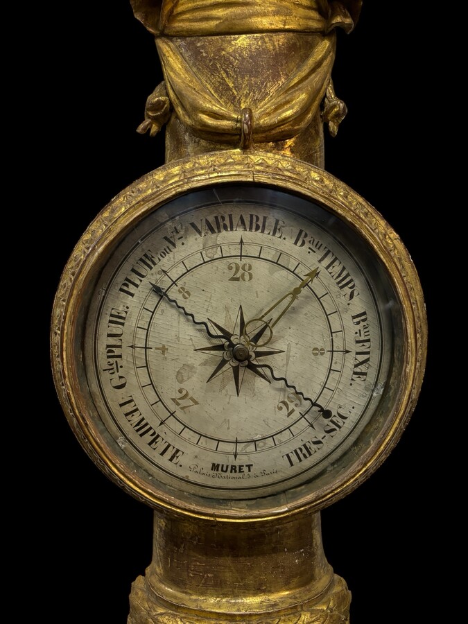 Large Barometer Muret à Paris in gilded wood 18th century Louis Seize decorative barometer in good condition ( cracked glass ) Dimensions : Height : 107 cm Diameter : 25,5 cm Paris, 18th century