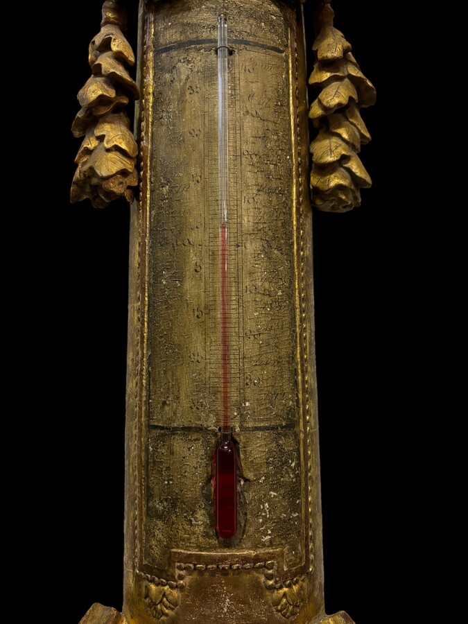 Large Barometer Muret à Paris in gilded wood 18th century Louis Seize decorative barometer in good condition ( cracked glass ) Dimensions : Height : 107 cm Diameter : 25,5 cm Paris, 18th century