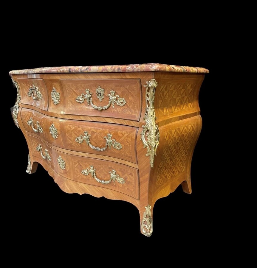 Large commode in Louis XV style 19th century Dresser with parquet veneer, gilt bronze ornaments and fitted with 2 small drawers at the top and 2 large ones below. At the top a beautiful Plateau en Marbre Breche d'Alep. Dimensions : Width : 139 cm 