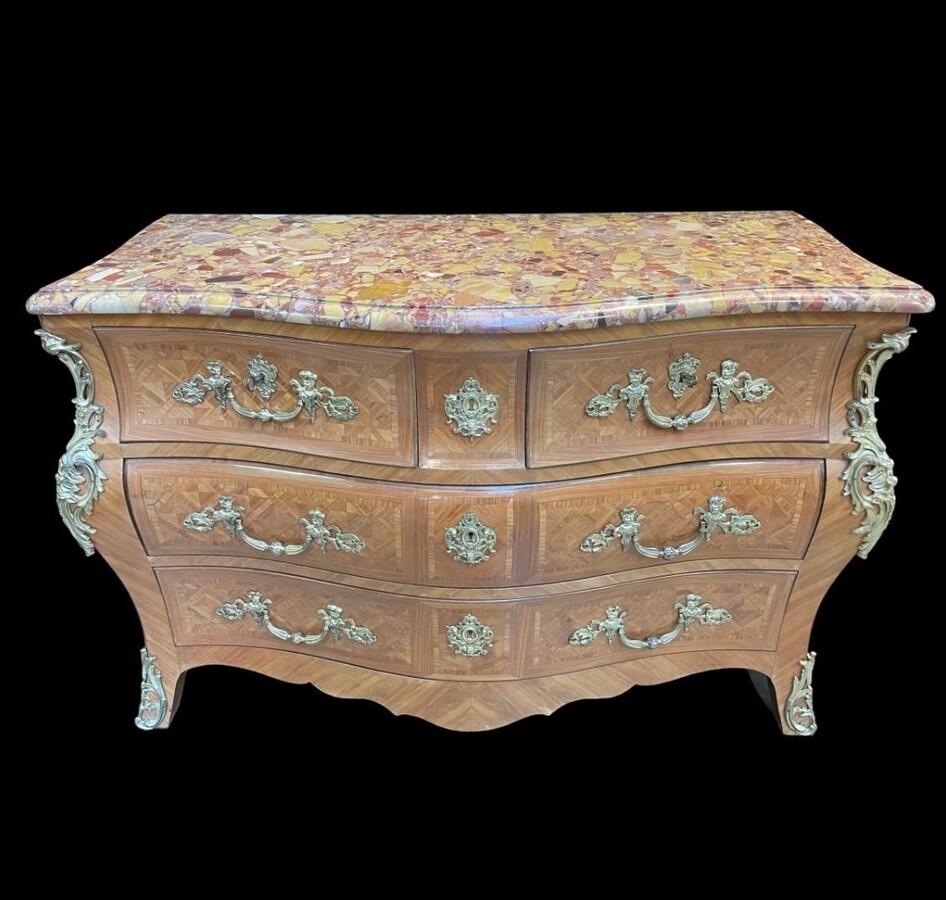 Large commode in Louis XV style 19th century Dresser with parquet veneer, gilt bronze ornaments and fitted with 2 small drawers at the top and 2 large ones below. At the top a beautiful Plateau en Marbre Breche d'Alep. Dimensions : Width : 139 cm 