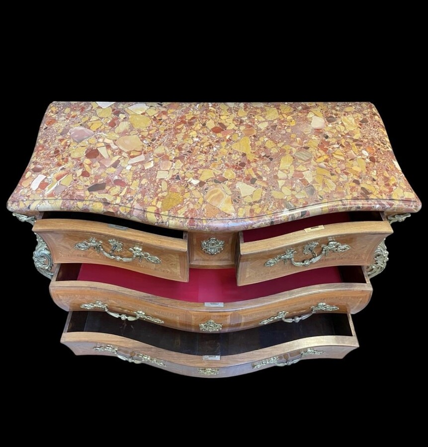 Large commode in Louis XV style 19th century Dresser with parquet veneer, gilt bronze ornaments and fitted with 2 small drawers at the top and 2 large ones below. At the top a beautiful Plateau en Marbre Breche d'Alep. Dimensions : Width : 139 cm 