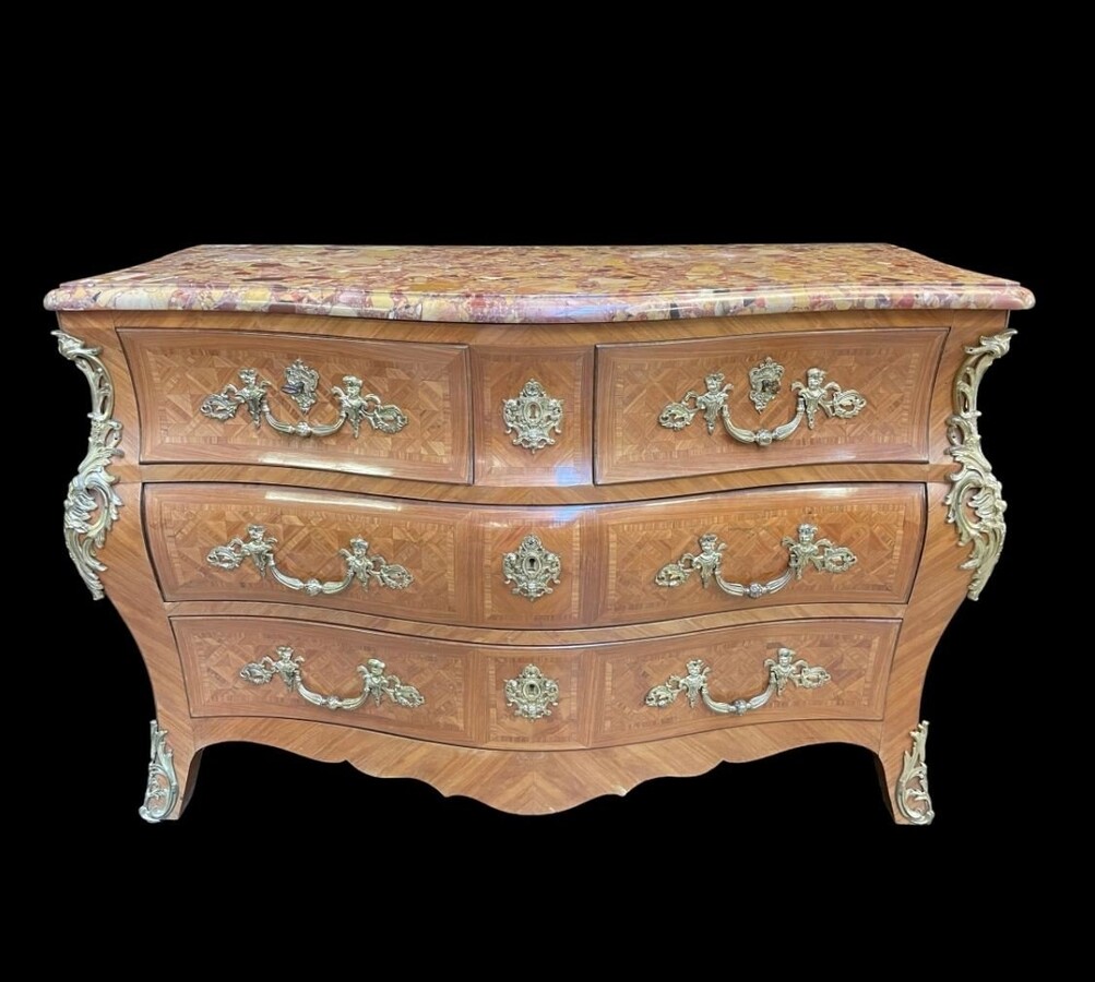 Large commode in Louis XV style 19th century Dresser with parquet veneer, gilt bronze ornaments and fitted with 2 small drawers at the top and 2 large ones below. At the top a beautiful Plateau en Marbre Breche d'Alep. Dimensions : Width : 139 cm 