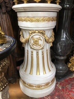 Large decorative column in the Louis XVI style 19th century. Painted in grey/gold and decorated with girlandes and Louis XVI ornaments. Dimensions: Height : 91,5 cm Diameter above : 45 cm Diameter below : 48 cm In good condition, dating from around 1860