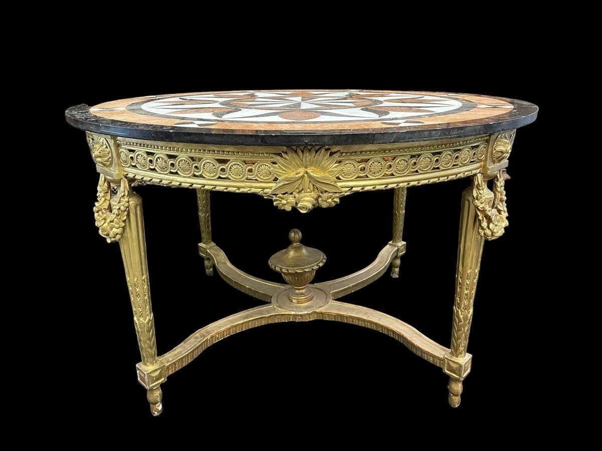 Large Gilded Wood Center Table / Quéridon With inlaid Marble Top In The Louis XVI Style From The Napoleon III Period. Nice Model All Carved Wood In Good Condition, No Original Gilding. Dimensions : Diameter : 120 Cm Height : 75 Cm