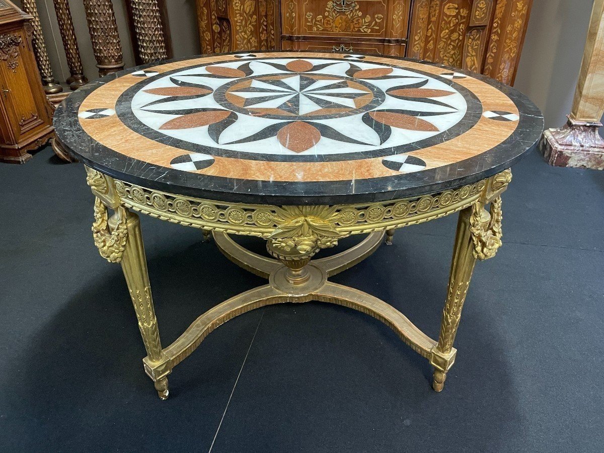 Large Gilded Wood Center Table / Quéridon With inlaid Marble Top In The Louis XVI Style From The Napoleon III Period. Nice Model All Carved Wood In Good Condition, No Original Gilding. Dimensions : Diameter : 120 Cm Height : 75 Cm