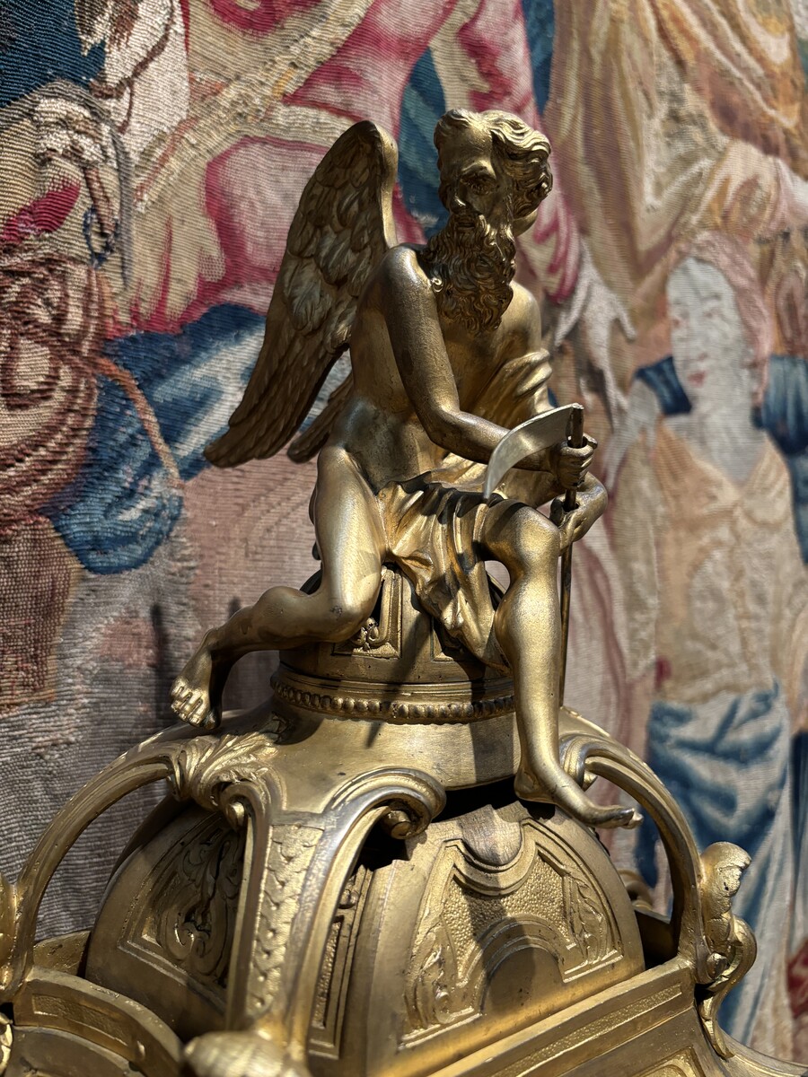 Large pendulum clock in gilt bronze with cut glass 19th century. Representation of Chronos figure , winged Mythological beasts and decorations in bronze working with a suns balance. Richly decorated dial signed R.COTTIN.26 Rue Amelot PARIS