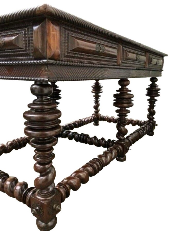 Large Portuguese centre table with 6 legs 18th century. Very decorative table with a beautiful patina on 6 legs with 3 drawers and a finish on all sides and decorated with bronze ornaments underneath.