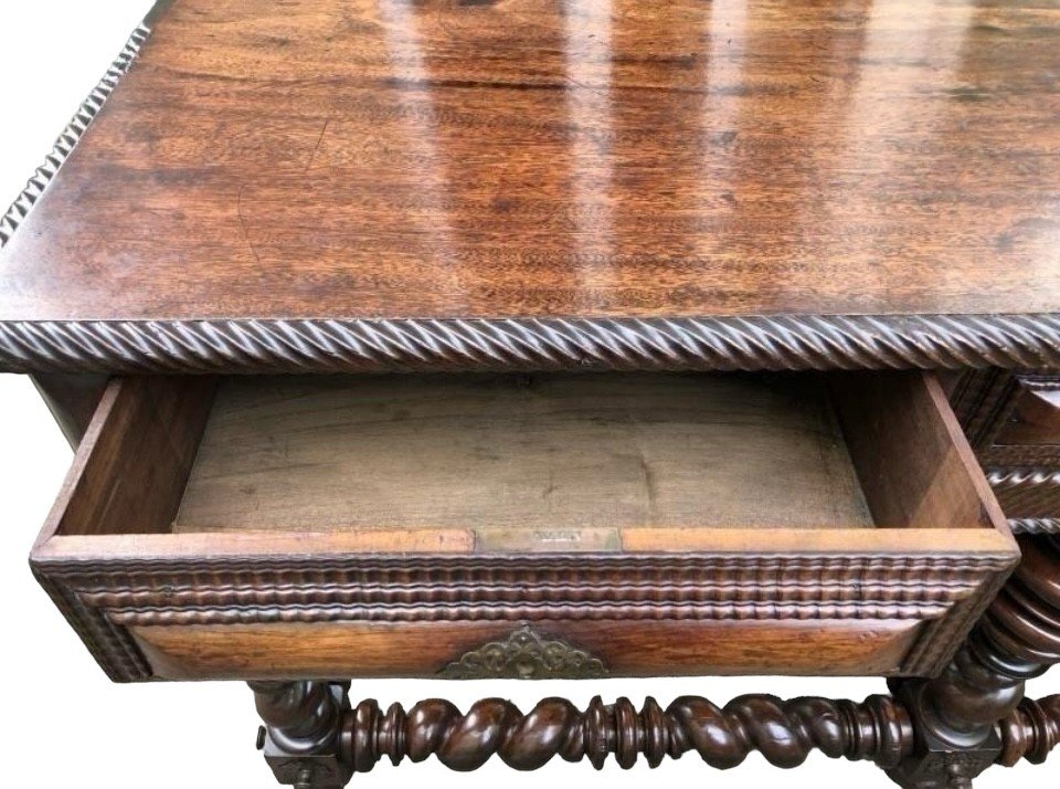 Large Portuguese centre table with 6 legs 18th century. Very decorative table with a beautiful patina on 6 legs with 3 drawers and a finish on all sides and decorated with bronze ornaments underneath.