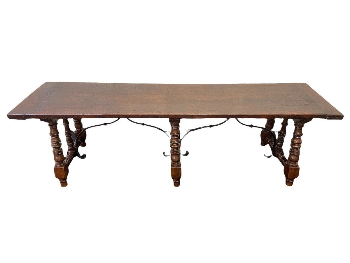 Large Spanish 6-legged walnut table 17th century Nice solid table with 6 legs, 2 connecting irons and a thick walnut top with a beautiful patina. Dimensions : Width : 266 cm Height : 76 cm Depth : 73 cm Thickness top : 4 cm Exceptional Spanish table