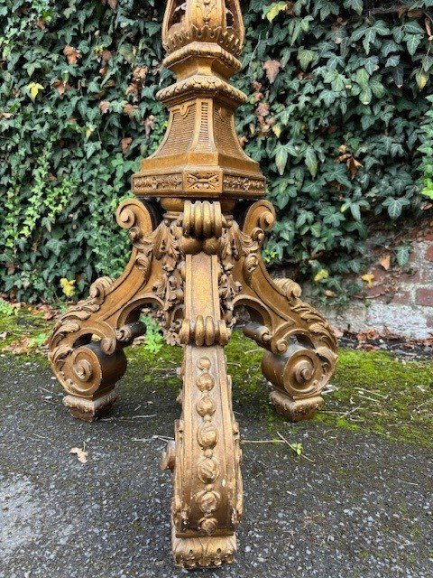 Large Torchère style Regence in gilt wood 19th century. Decorative torchère with openwork stem , decorated with ornaments , scrolls and tassels standing on 3 large scrolled legs. Dimensions : Height : 166 cm Width : 62 cm Depth : 56 cm 